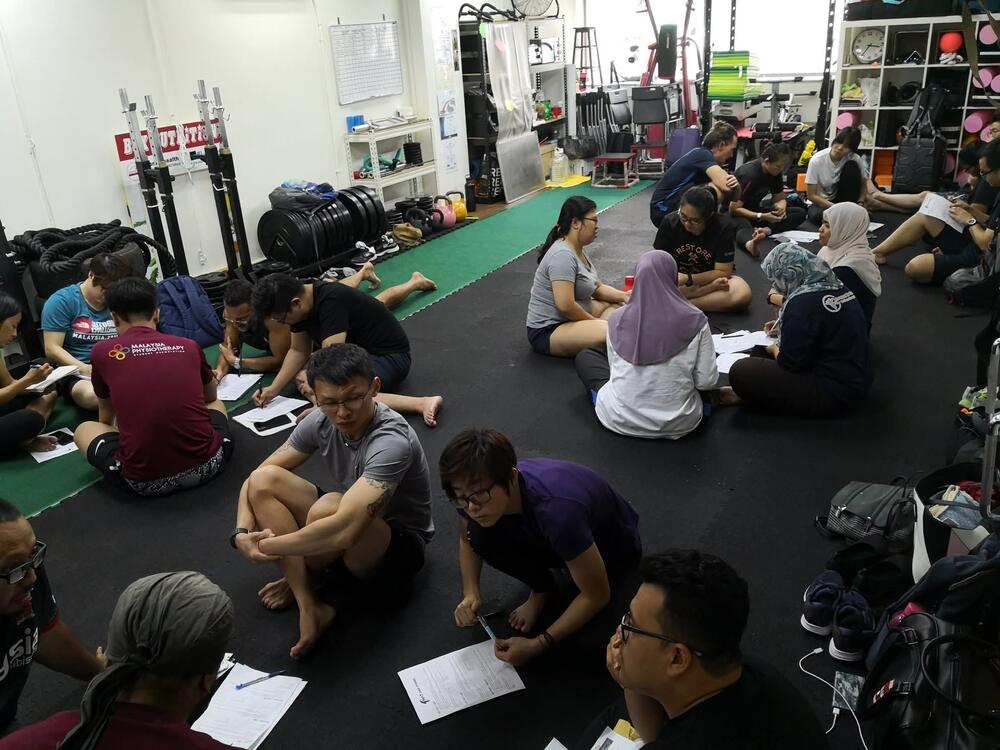 Coaches practising during a Topman workshop
