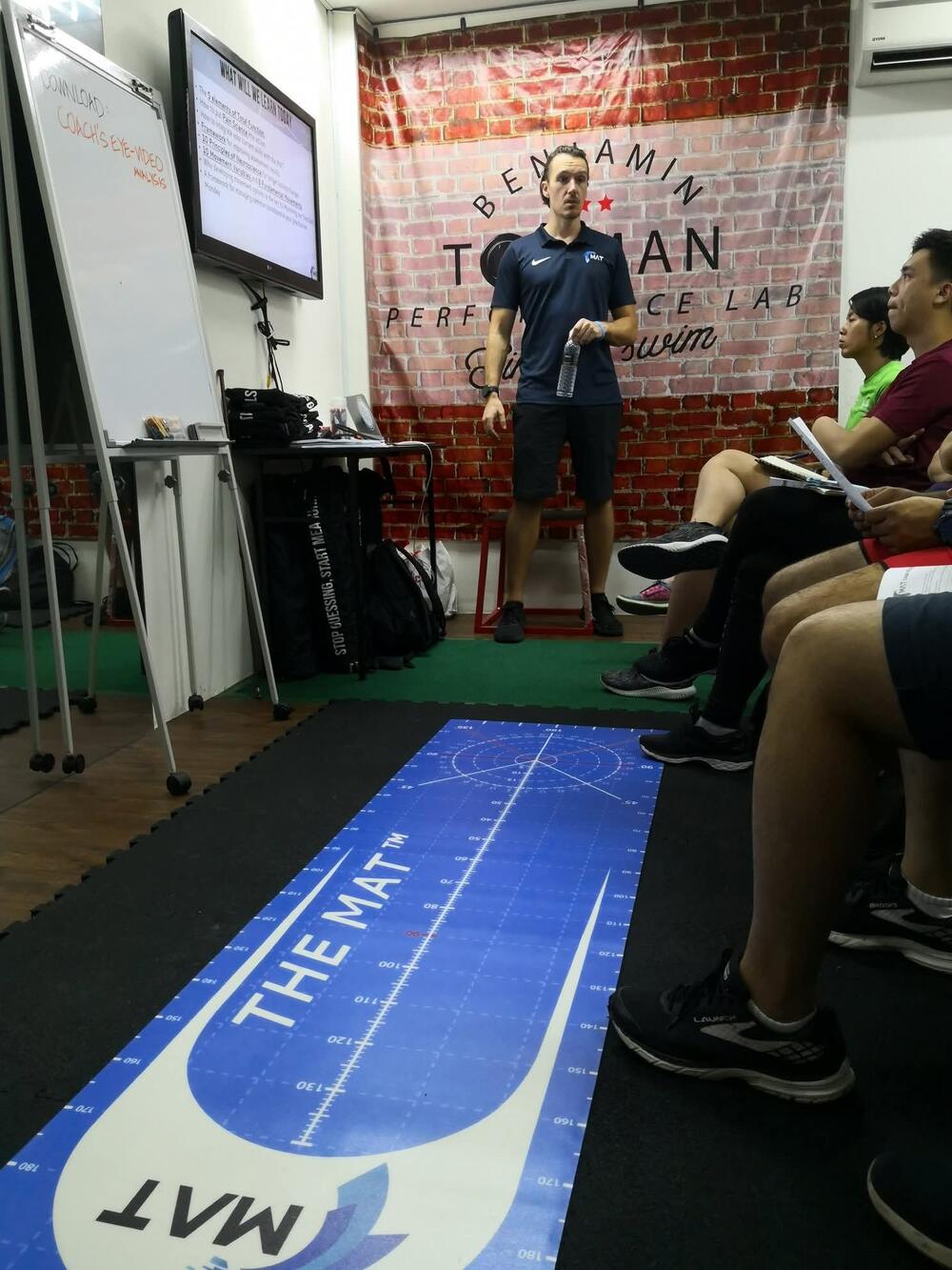 Coach presenting a workshop in the studio